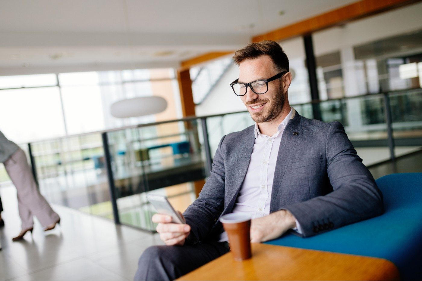 businessman-taking-a-break-with-a-cup-of-coffee-JW4B3DH